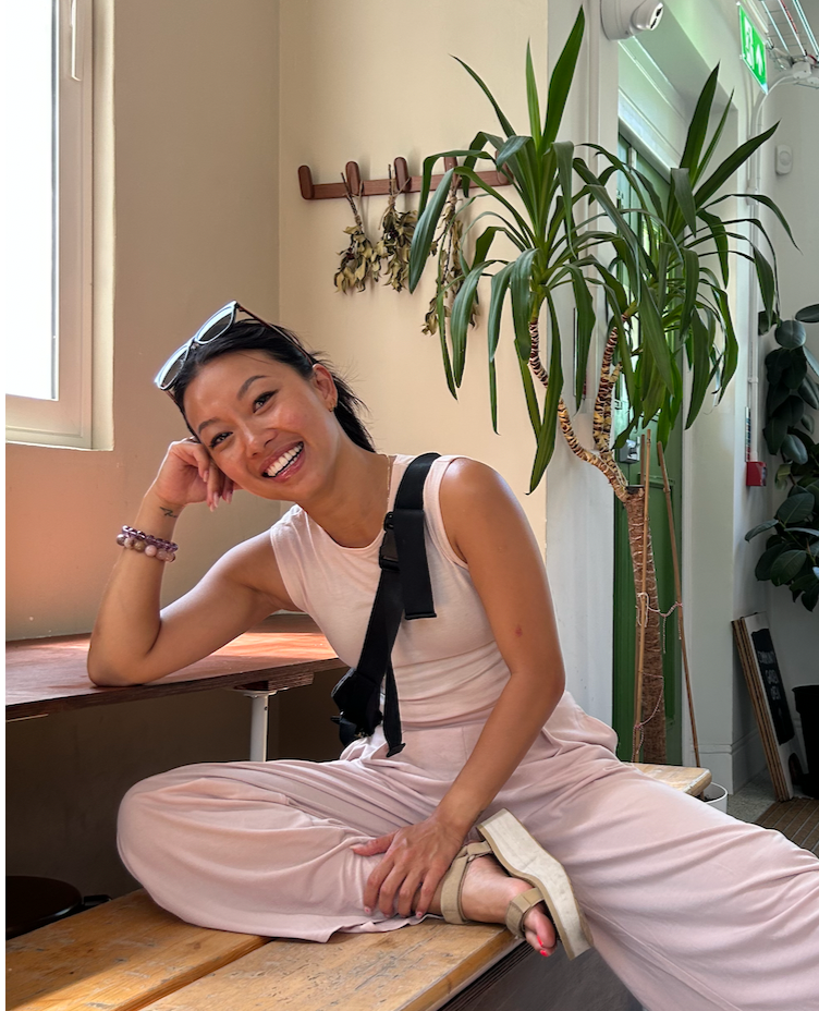Lorraine Tai smiling in a relaxed setting